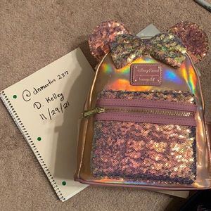 Earidescent loungefly Disney 50th